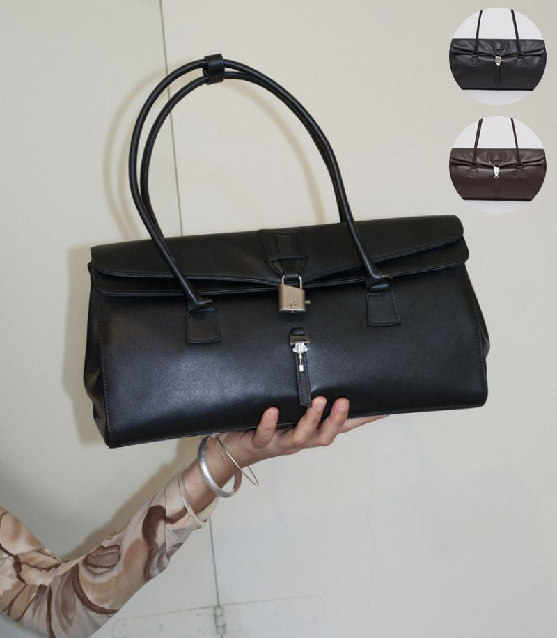 【WE ARE】Korea Archivepke Luv lock duffle armpit bag OVBAX24521