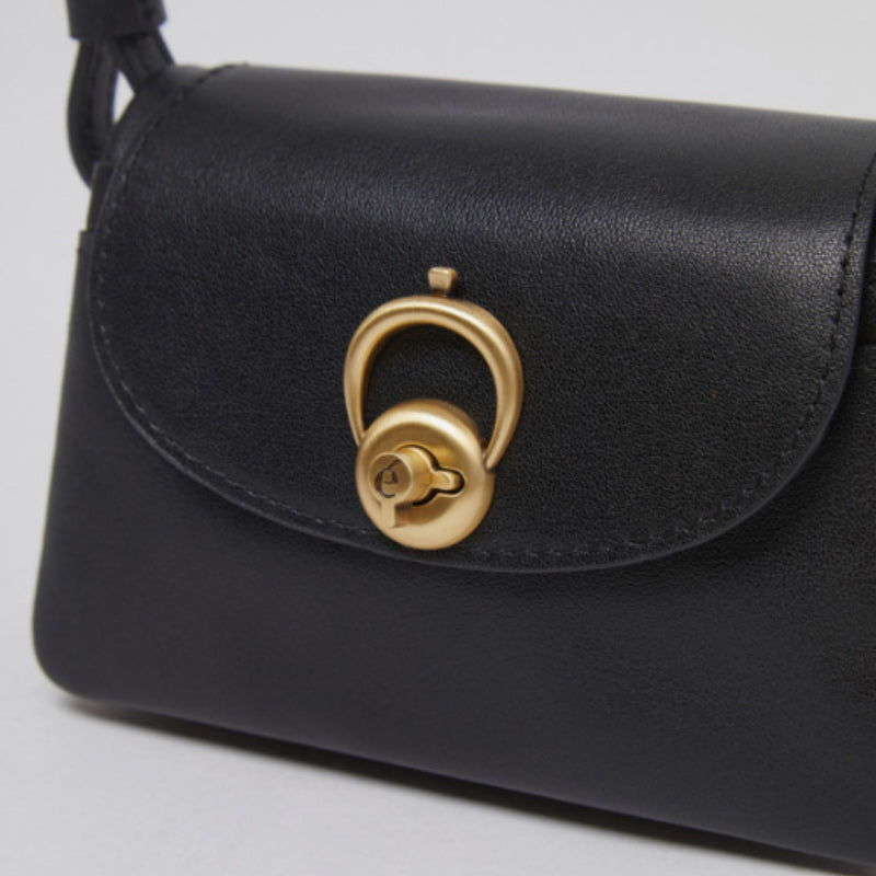 【WE ARE】Korea Archivepke Luv hole mini crossbody mini bag OVBRX24511