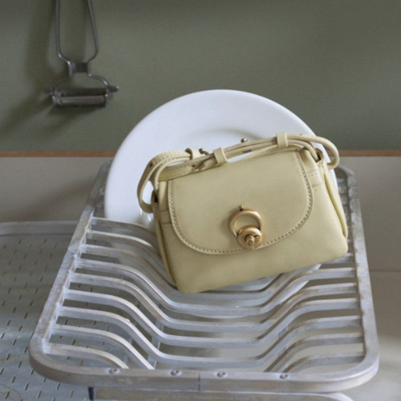 【WE ARE】Korea Archivepke Luv hole mini crossbody mini bag OVBRX24511