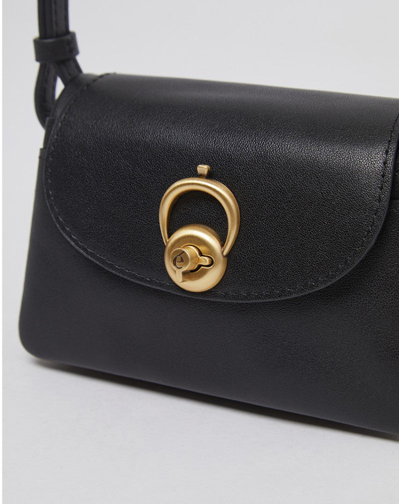 【WE ARE】Korea Archivepke Luv hole mini crossbody mini bag OVBRX24511