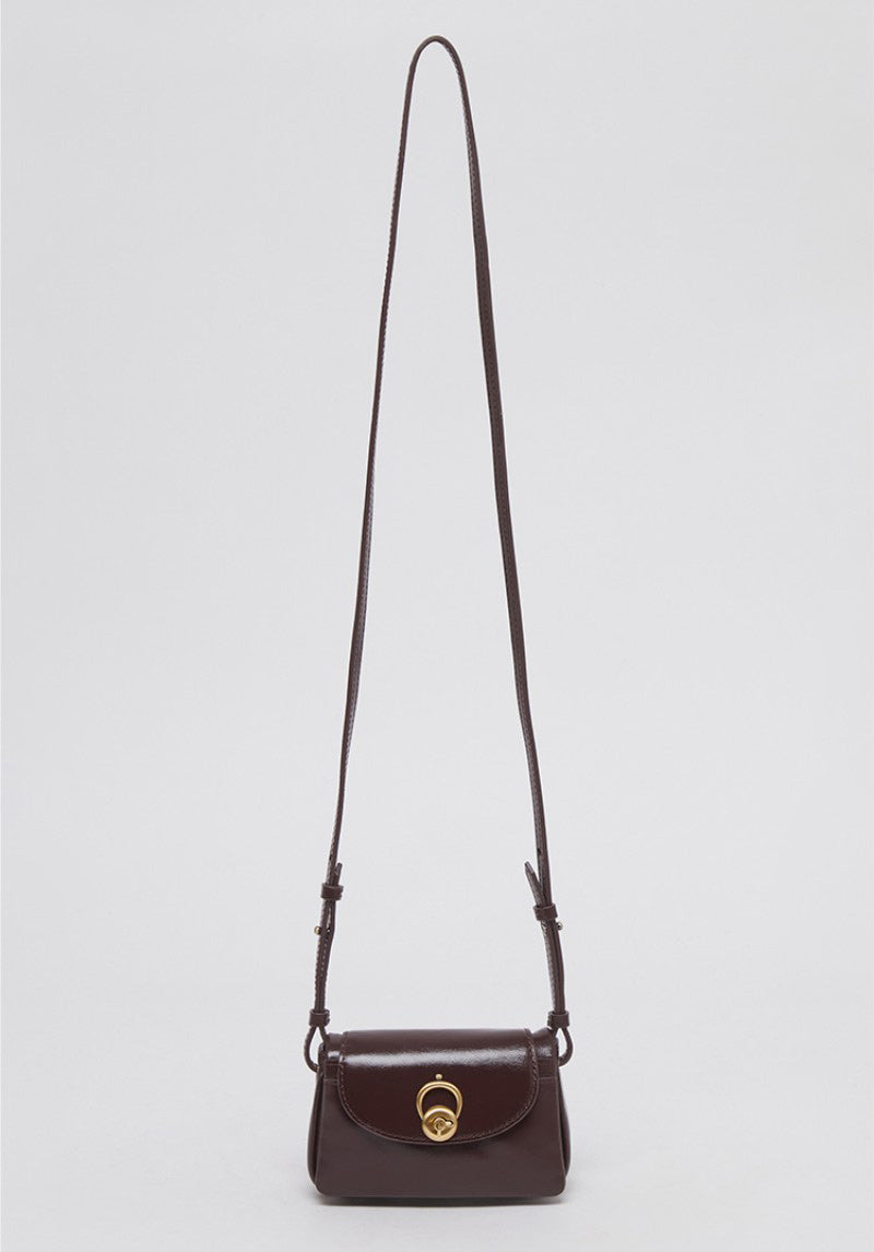 【WE ARE】Korea Archivepke Luv hole mini crossbody mini bag OVBRX24511