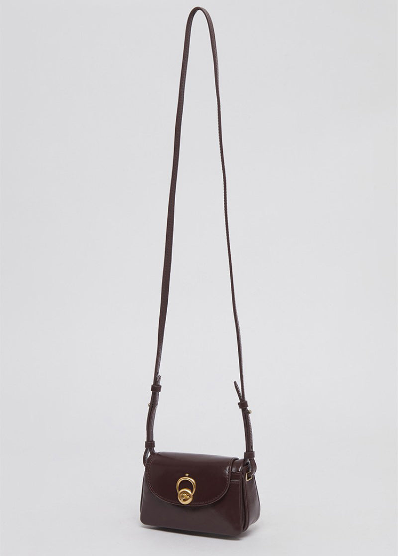 【WE ARE】Korea Archivepke Luv hole mini crossbody mini bag OVBRX24511