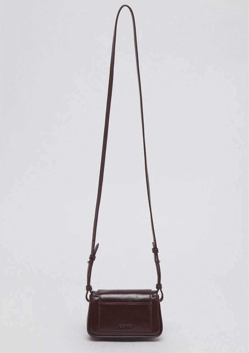 【WE ARE】Korea Archivepke Luv hole mini crossbody mini bag OVBRX24511
