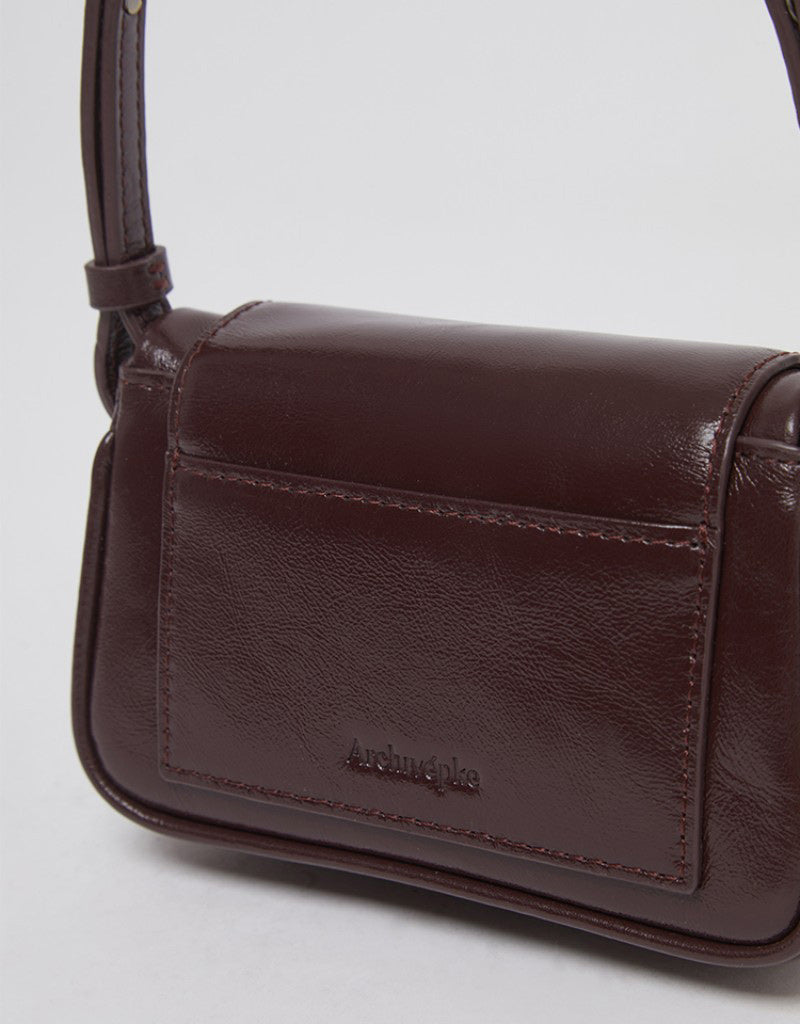 【WE ARE】Korea Archivepke Luv hole mini crossbody mini bag OVBRX24511