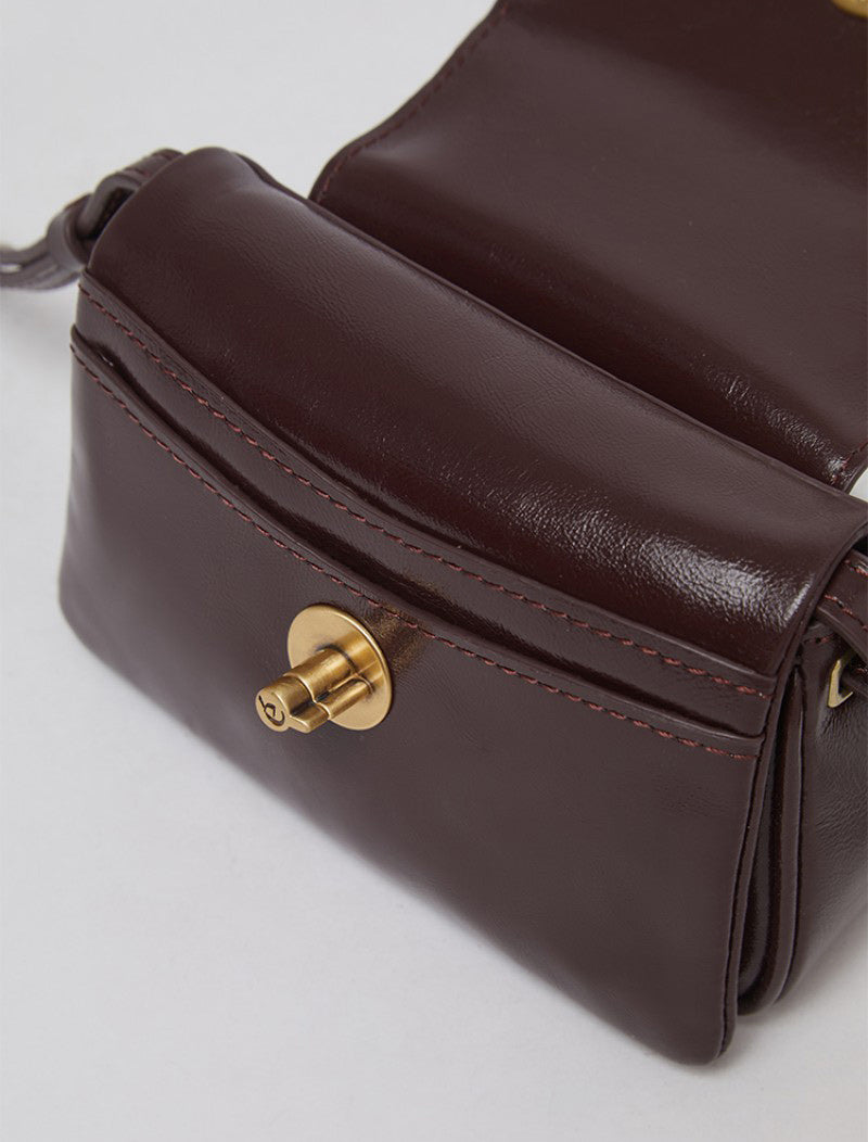 【WE ARE】Korea Archivepke Luv hole mini crossbody mini bag OVBRX24511