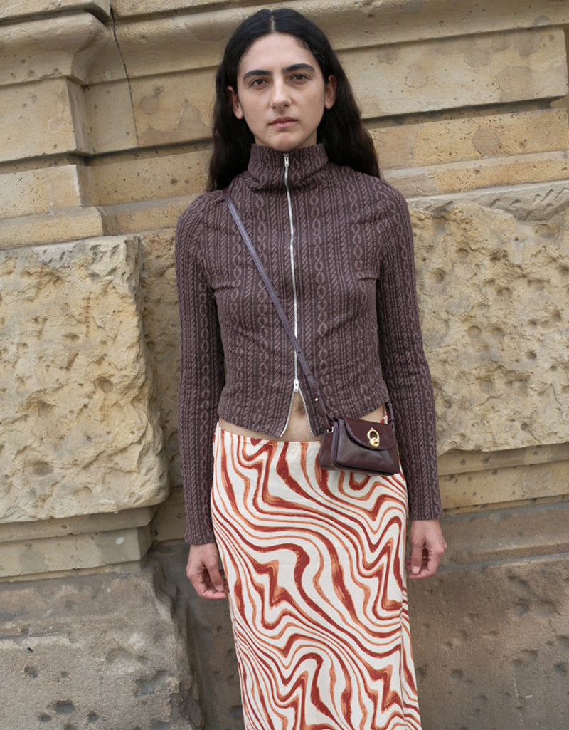 【WE ARE】Korea Archivepke Luv hole mini crossbody mini bag OVBRX24511