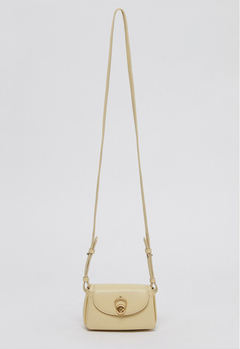 【WE ARE】Korea Archivepke Luv hole mini crossbody mini bag OVBRX24511