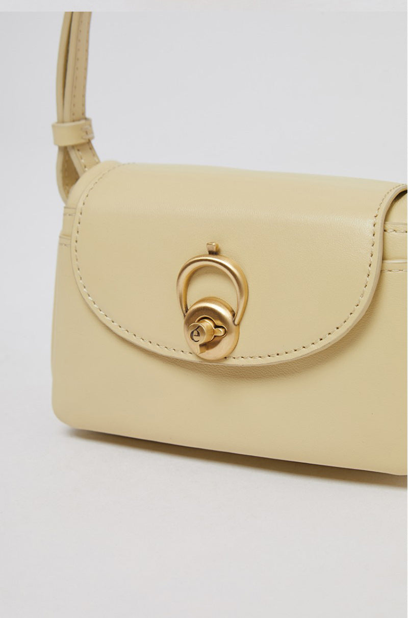 【WE ARE】Korea Archivepke Luv hole mini crossbody mini bag OVBRX24511