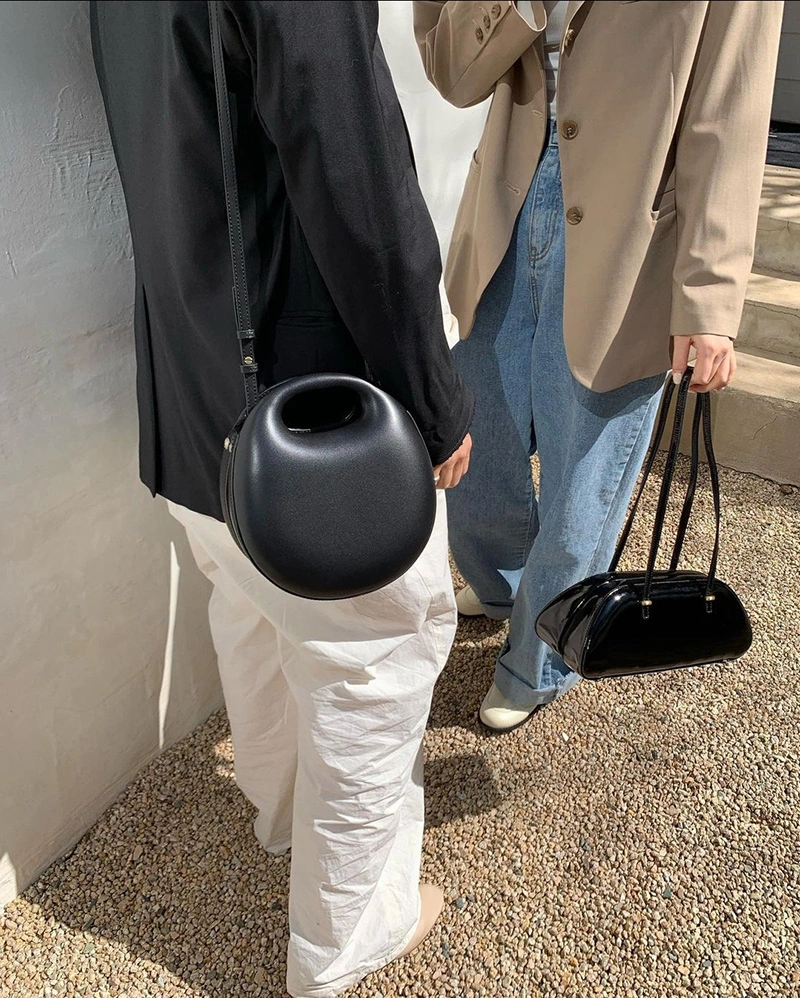 【WE ARE】Korea Archivepke Shell bagel bag OVBAX24016