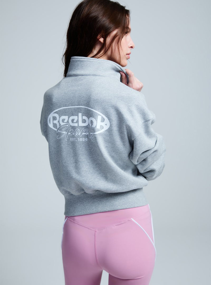 女款【WE ARE】韓國Reebok 短版半拉鏈大學TRETS5EM46